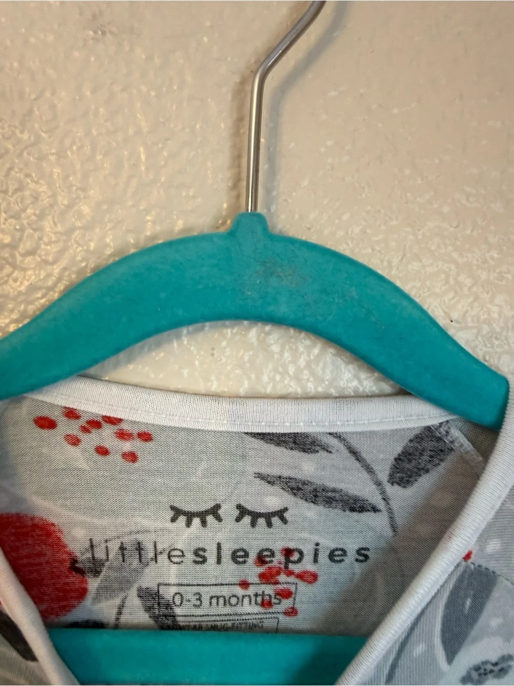 Little Sleepies Floral Footed One-Piece in Light Blue, Red, Black, White